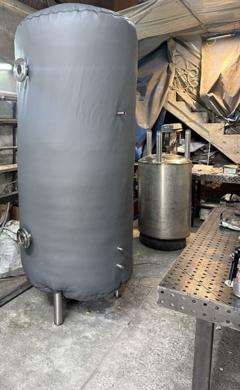 Stainless steel buffer tanks in eco-leather casing